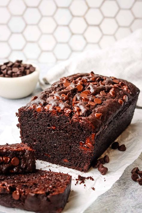 This easy chocolate loaf cake is deep, dark, and deliciously moist thanks to the use of Greek yogurt. It is so simple to make and perfect for your most intense chocolate cravings. Greek Yogurt Chocolate Cake, Chocolate Fudge Loaf Cake, Moist Chocolate Loaf Cake, Healthy Loaf Cake, Chocolate Loaf Cake Recipe, Yogurt Loaf Cake, Chocolate Yogurt Cake, Greek Cake, Chocolate Tea Cake