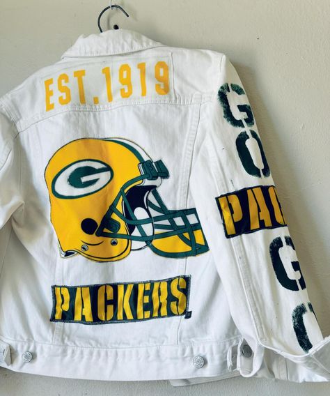 Milk 🥛 White 🤍 Upcycled 1 of 1 denim GREEN BAY PACKERS jacket 🤍🤍🤍🤍🤍 Hand detailed & stitched 🤍 soooo comfortable and CHIC! 🤍🥰 FREE SHIPPING OVER $75 🤍 LINK IN BIO #greenbaypackers #mondaynightfootball #upcomingszn #packersseason #nfl #nfldraft #nflnews #nflapparel #upcycledclothing #handmade #shoplocal #shopsmall #smallbusiness I Game Day Jean Jacket, Denim Jacket Diy Paint, Green Bay Packers Clothing, Denim Diy Clothes, Custom Jean Jacket, Diy Denim Jacket, Custom Shoes Diy, Diy Jacket, Custom Jeans