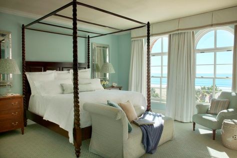 The stunning room decor reflects the hotels coastal position Guest Bedroom Inspiration, Light Blue Bedroom, White Coverlet, White Linens, Murphy Bed Plans, House Of Turquoise, Bedding Inspiration, Four Poster Bed, Dark Furniture