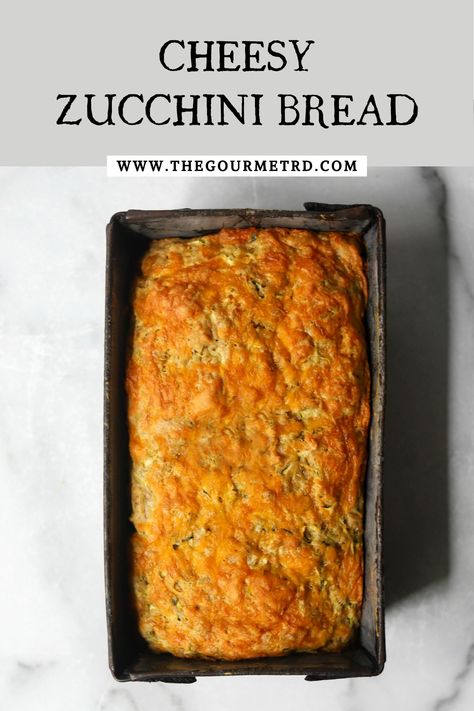 A loaf of cheesy zucchini bread in a vintage tin. Zucchini Parmesan Bread, Cheesy Zucchini Bread, Zucchini Cheesy Bread, Savory Quick Bread, Savory Zucchini Bread, Zucchini Cheddar, Zucchini Parmesan, Zucchini Cheese, Parmesan Bread