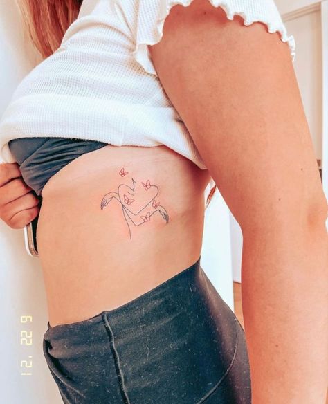 Self Love Rib Tattoo, Love Rib Tattoo, Cute Rib Tattoos For Women, Unique Rib Tattoo, Rib Tats, Peace Sign Tattoos, Simple Heart Tattoos, Love Symbol Tattoos, Rib Tattoos For Women