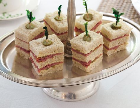 Traditionally, tea sandwiches are dainty little bites, but these triple-stack Corned Beef Tea Sandwiches, made with hearty oatmeal bread, are enough to make a meal. Party Sandwiches Recipes, Beef Tea, Tea Party Sandwiches Recipes, Travel Edinburgh, Mustard Butter, Edinburgh London, Bread Bites, Irish Tea, Tea Party Sandwiches