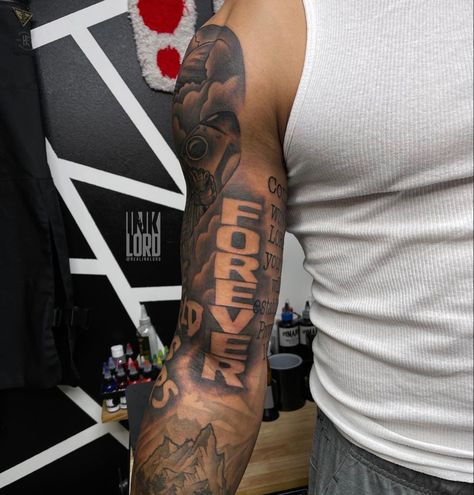 Mens Tattoos Sleeves Ideas, Tattoo Ideas For Men Inside Bicep, Fear God Shoulder Tattoo, Back Of The Bicep Tattoo, Arm Filler Tattoo Ideas Men, Bicep Tattoo Men Sleeve, Behind Arm Tattoo For Men, Rasta Tattoo Men, Foe Tattoos Men