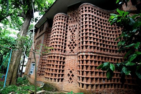 Every time R Narayanan, a senior IAS officer, stepped out for a walk with his wife Geeta, he would dread the moment they approached a red- brick house in their neighbourhood because of the way she would crane her neck for a closer look. Soon, she learned that the residence was built by Laurie Baker. A week later, the accomplished Bharatanatyam dancer met the 6’4” architect with blue eyes; he would build her a home in her image — a dark red-orange spiral brick house that twirled like a ... Lauri Baker Architecture, Laurie Baker Architecture, Laurie Baker, Ias Officer, Bharatanatyam Dancer, Brick Bonds, Brick Works, Brick Art, Red Brick House