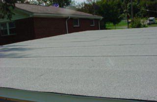 How to Install a Granulated Rolled Roofing | HubPages Roll Roofing, I Hop, Asphalt Roof, Roofing Diy, Roof Installation, Roof, Woodworking, Outdoor Decor