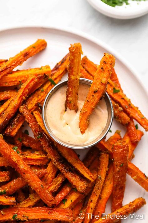 Have you ever tried carrot fries? If not, you need to! They're an easy-to-make, delicious, and healthy side dish. Seasoned to perfection, the sweetness of the carrot amplifies as the natural sugars caramelize, and the outside becomes crispy and delicious while the inside stays soft. Carrot fries are a healthy recipe that feels like a treat! #theendlessmeal #carrots #carrot #carrotfries #fries #sidedish Carrots In The Air Fryer, Carrot Fries Baked, Balanced Dinner, Butternut Squash Fries, Frozen Sweet Potato Fries, Carrot Fries, Baked Carrots, Easy Oven, Fries Recipe