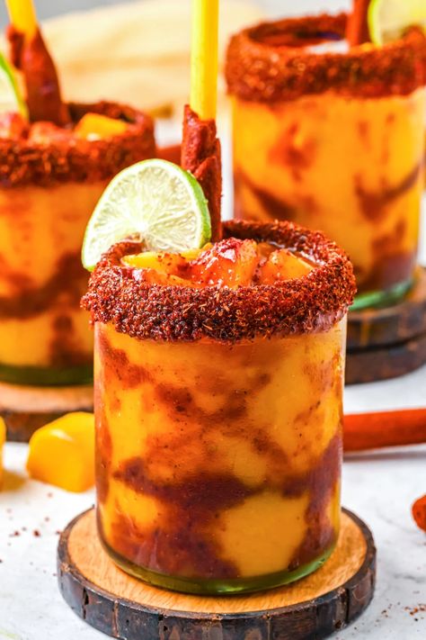 Mangonada Recipe Alcohol, Tajin Smoothie, Mango And Tajin, Chamoy Drinks Cocktails, Drinks With Tajin Rim, Drinks With Tajin, Mango Mixed Drinks, Tamarind Vodka Recipes, Tajin Cocktails