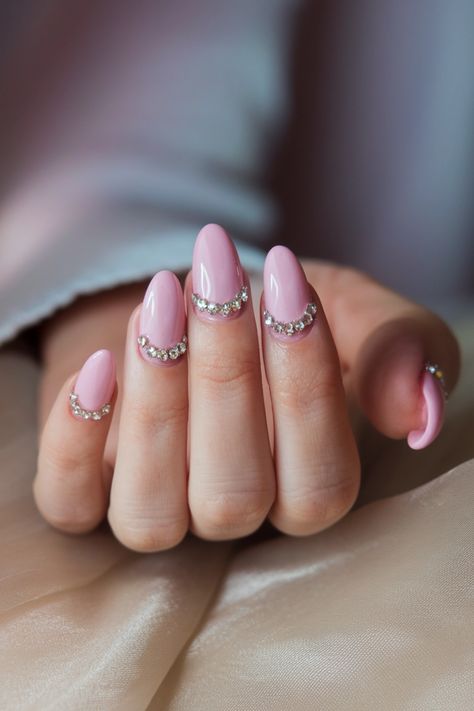 Elevate your style with chic short pink nails that capture attention! This design features a glossy finish paired with sparkling glitter accents, giving your natural nails a trendy twist. Perfect for any occasion, these pink nails embody a playful yet sophisticated vibe. Transform your manicure game and show off your unique personality with this stunning nail art! #PinkNails #NailArt #GlitterNails #ShortNails #NailInspiration Pink Engagement Nails, Pink Nails With Glitter, Short Pink Nails, Engagement Nails, Pink Engagement, Nails With Glitter, Spring Florals, Seasonal Nails, New Nail