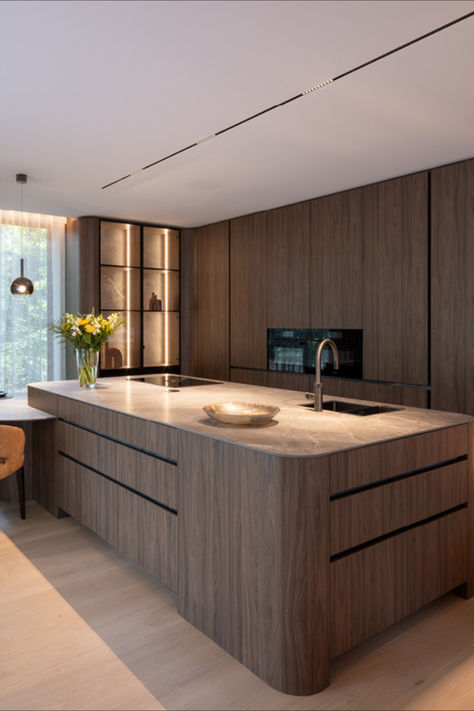 Keeping things sleek and durable with this Uniceramica Fior di Bosco worktop and fireplace! 🔥 Scratch, heat, and stain-resistant—perfect for a busy home. Uniceramica ceramic slabs offer exceptional resistance to scratches, heat, and stains, making them ideal for high-use spaces like kitchens and bathrooms. 
 
Photography: Bernd Hendrickx
Design & execution: Insuite & Van Raemdonck
Project: Sylvestris Wonen
Location: Residence Delicia, Waasmunster (BE) Wall Cladding, Contemporary Ceramics, Kitchen Inspirations, Kitchens Bathrooms, Bathrooms, Kitchens, Fireplace, Stain, Sleek