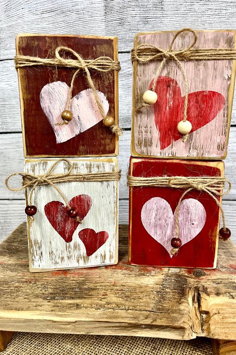 Elevate your rustic home decor game with our unique reclaimed wood primitive valentine blocks. Perfect as mantel decorations or tiered tray additions, these handcrafted masterpieces make for the ideal Valentine's Day gift. Click through to see how these beautiful blocks can transform your home! Wood Crafts For Valentines Day, Rustic Valentine Crafts, Valentine Blocks, Valentine Craft Decorations, Valentine Wood Crafts, Primitive Valentine, Saint Valentin Diy, Valentines Bricolage, Scrap Wood Crafts