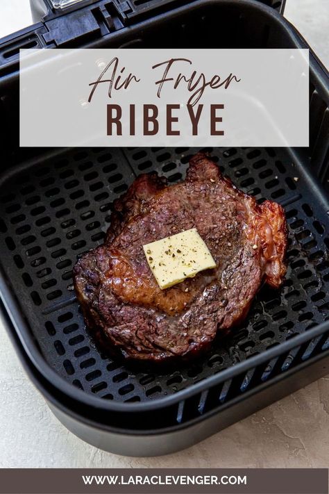 A cooked ribeye in an air fryer basket with butter and salt and pepper on top. Air Fryer Ribeye Steak Medium, Air Fryer Ribeye Steak, Air Fryer Ribeye, Steak In The Air Fryer, New Air Fryer Recipes, Air Fryer Recipes Snacks, Ribeye Steak Recipes, Air Fryer Steak, Air Fryer Cooking Times