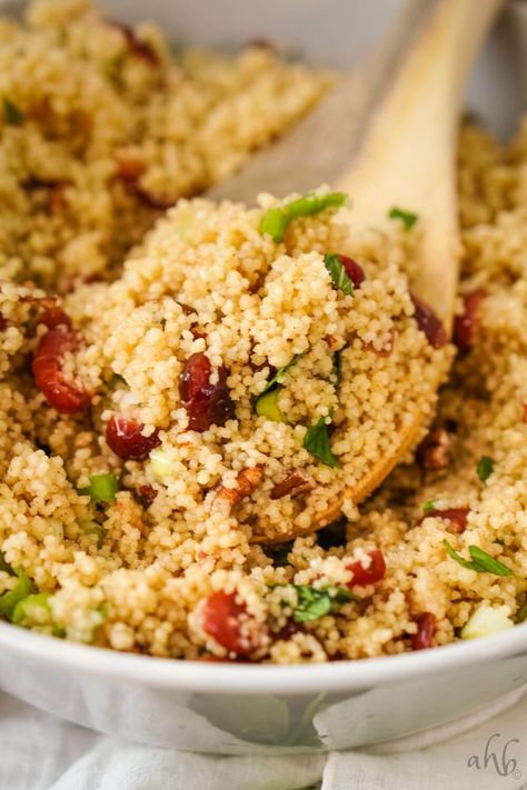 Fruity, nutty, fresh, and delicious Cranberry Couscous Salad is a delightfully different side dish that’s easy to make and pairs well with pork, chicken or turkey. Cranberry Couscous, Big Mac Tater Tot Casserole, Moroccan Couscous Salad, Bic Mac, Curried Couscous, Unique Side Dishes, Tator Tots, Pork Chicken, Tot Casserole