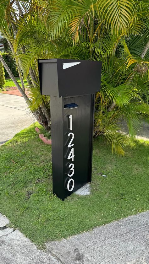 Dream Mailboxes | Agave Luxe Modern Black mailbox installed with large Mexican beach pebbles around the base 📫🏡 #exteriordesign #curbappeal #homedecor... | Instagram Modern Mailbox Diy, Coastal Mailbox, State Farm Office, Mexican Beach Pebbles, Black Mailbox, Custom Mailboxes, Modern Mailbox, Modern Entrance, Wall Mount Mailbox