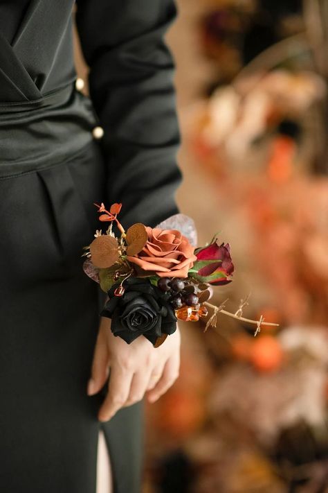 Wrist corsage with a beige elastic band, easy to wear, comfortable and firm, fits most wrist sizes. The elegant wrist corsages are made up of silk hybrid tea rose, burgundy silk petite rose, burnt orange petite avalanche rose accented with burgundy berries, burgundy eucalyptus, terracotta Gunni eucalyptus, golden leaves, and amber stone floral pick. #wrist_corsage #corsage_bracelet #corsage_wristbands Corsages For Wedding, Orange Corsage, Gunni Eucalyptus, Burgundy Eucalyptus, Diy Wrist Corsage, Wedding Mother Of Bride, Bracelet Corsage, Wrist Corsage Bracelet, Wedding Corsages