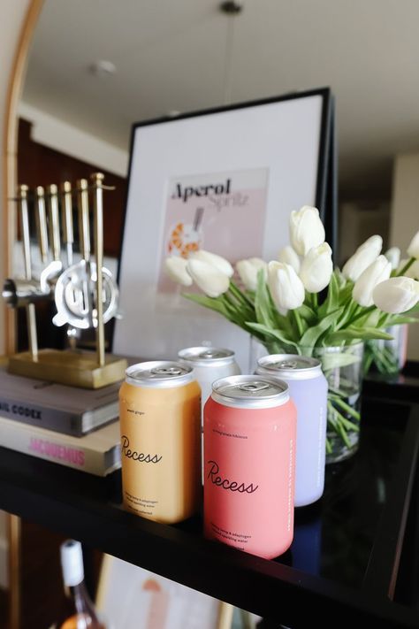 Looking for spring bar cart inspiration? Check out my bar cart and how you can create the cutest styled bar cart this spring! Bar Cart Flowers, Glitter Cake Pops, Creative Graduation Party Ideas, Bar Cart Ideas, Mason Jar Drinks, Sophia Lee, Gold Graduation Party, Apartment Decorating Living, Cart Ideas