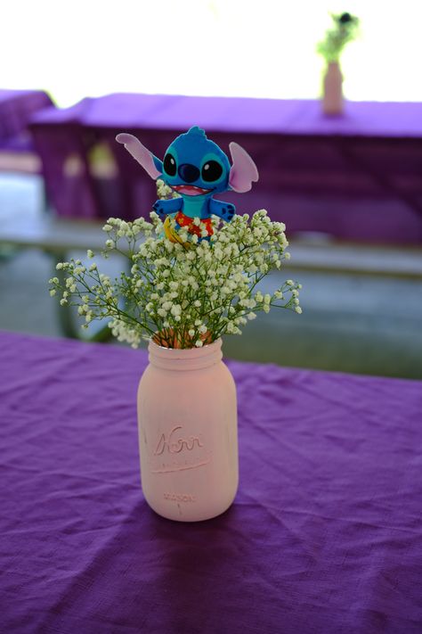 Stitch Birthday Party Centerpieces, Stitch Party Table Decorations, Diy Stitch Centerpieces, Lilo And Stitch Table Centerpiece, Stitch Table Decorations, Stitch Party Centerpiece Ideas, Stitch Baby Shower Centerpieces, Stitch Table Centerpieces, Stitch Centerpiece Ideas