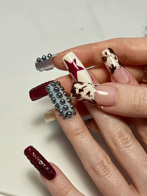 #autumnnails #fallnails #cowhide #cowhidenails #burgandynails #chromenails #3dnails #starnails #squarenails #longnails #frenchnails Cowhide Nail Design, Chevy Nails Designs, Bull Nails Art, Texas Flag Nails, Western Inspo Nails, Cowboy Nail Designs, Bull Skull Nails, Rodeo Inspired Nails, Country Valentines Nails