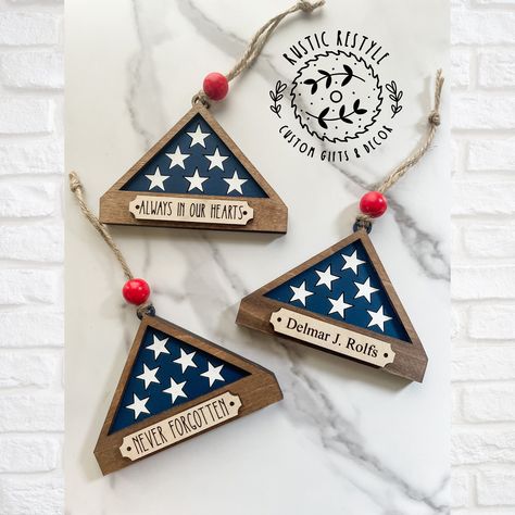 Folded Flag Remembrance ornament and military flag keepsake can be personalized with engraved names by RusticRestyle on Etsy Folded Flag, Always In Our Hearts, Military Flag, Laser Cut Wood Crafts, Laser Engraved Ideas, Craft Show Ideas, Memorial Ornaments, Ornament Crafts, Wooden Ornaments