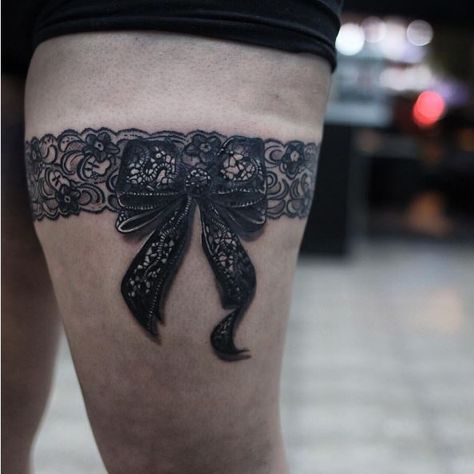 50+ Lace Belt Garter Tattoos Designs (2021) Gun, Bow on Thigh, Leg Tattoo Garter, Garter Belt Tattoo, Belt Tattoo, Lace Thigh Tattoos, Garter Tattoos, Thigh Garter Tattoo, Corset Tattoo, Bow Tattoos, Stocking Tattoo