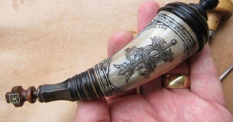 Very small horn tip remnant made a nice size priming or salt horn. The base is turned from ebony and the plug from lignum vitae. The casc...