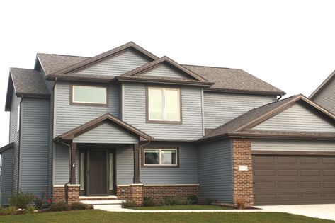 Brown Trim House Exterior, Brown Exterior House Colors, Weathered Wood Shingles, Brown House Exterior, Brown Garage Door, Light Blue Houses, Exterior Siding Options, Blue Siding, Brown Roof