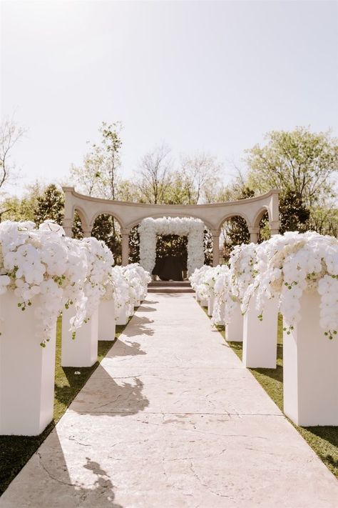 Wedding Decor, Wedding Inspo, Wedding Aisle Decor, Wedding Ideas, Spring Wedding, Clean White Spring Wedding, Classic Wedding, Simple and Elegant Wedding Design Raised Aisle Wedding, Simple Wedding Aisle Decor, White Floral Wedding Aisle, Haldi Card, White Roses Ceremony Aisle, Runway Wedding Aisle, White Roses Down The Aisle, Outdoor Wedding Entrance, White Flower Lined Aisle