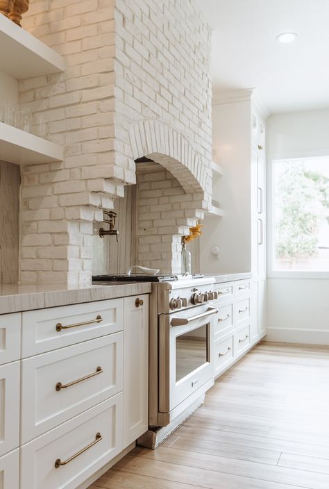 Winter Cliffs — The Idea Room Brick Stove Surround Kitchen Range Hoods, White Brick Range Hood, White Brick Mansion, Brick Oven Hood, Lime Wash Range Hood, Brick Hood Vent, Arched Oven Hood, Brick Stove Hood, Brick Vent Hood Kitchen