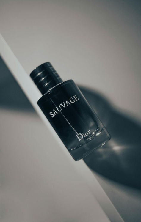 Experience the irresistible allure of Dior Sauvage. This iconic fragrance blends fresh bergamot, spicy Sichuan pepper, and deep amber wood to create a bold and captivating scent. Perfect for any occasion, Dior Sauvage exudes confidence and sophistication. Feel empowered and unforgettable. Keywords: Dior Sauvage, iconic fragrance, captivating scent, confidence, sophistication, long-lasting, high-quality, timeless elegance. Dior Savage, Mens Perfume, Dior Sauvage, Blue Stuff, Sichuan Pepper, Dior Perfume, Men's Fragrance, Perfume Collection, Perfume Spray