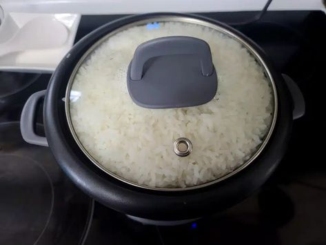 A rice cooker with a fully cooked batch of rice in it. How To Make Sushi Rice In Rice Cooker, Sushi Rice In Rice Cooker, Rice In Rice Cooker, Making Sushi At Home, Sushi Rice Recipe, Make Sushi Rice, Kinds Of Sushi, Sushi Rice Recipes, Sushi Sauce