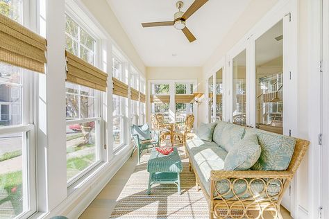 Large porch with windows turned into an elegant sunroom [Design: Echelon Interiors] Narrow Sunroom Ideas, Narrow Sunroom, Coastal Sunroom, Sunroom Renovation, Sunroom Remodel, All Season Room, Four Seasons Room, Sunroom Furniture, Sunroom Addition