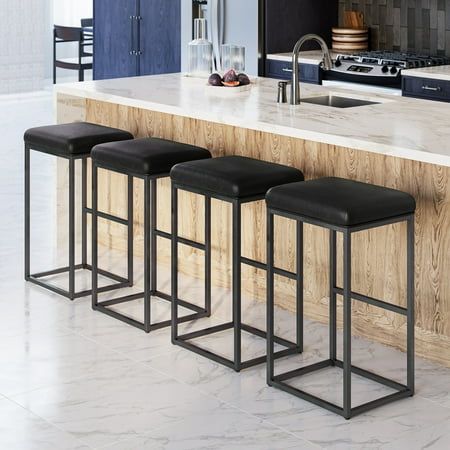 Whether sidled up to the kitchen island or used to round out a breakfast nook, this bar & counter stool brings a touch of class and sophistication. Crafted from strong industrial metal, it features a streamlined base fitted with a must-have footrest and large thick cushion that makes sitting nice and comfortable. Nice and tall, this bar stool tucks nicely under kitchen counters, dining tables, and desks, helping you save space and keep your area looking organized. Plus, it arrives in a set of four. Specifications: Material: PU leather, metal, foam Overall dimensions: 18.5"L x 15.16"W x 30.24"H Cushion thickness: 3.15" Weight capacity: 300 lbs Each barstool net weight: 12.35 lbs Fit for 41" to 45" height table Package included: 4 x 30 Inch Barstools 1 x User Manual Size: 30 Inch Set of 4. Kitchen Island Chairs, Barstools Modern, Chairs For Kitchen Island, Modern Black Kitchen, Island Chairs, Bar Stools Kitchen Island, Kitchen Counter Stools, Stools For Kitchen Island, 30 Bar Stools