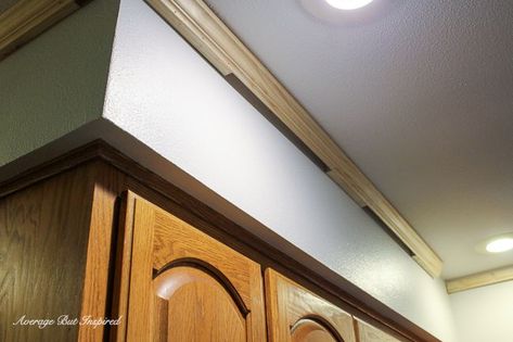 DIY Kitchen Soffit Makeover: How to Disguise a Kitchen Soffit - Average But Inspired Painted Soffit In Kitchen, Large Kitchen Soffit Overhang, Soffett In Kitchen, Kitchen Soffit Makeover, Soffit Makeover, Soffit Above Kitchen Cabinets, Soffit Ideas, Kitchen Cabinet Molding, Cream Colored Kitchen Cabinets