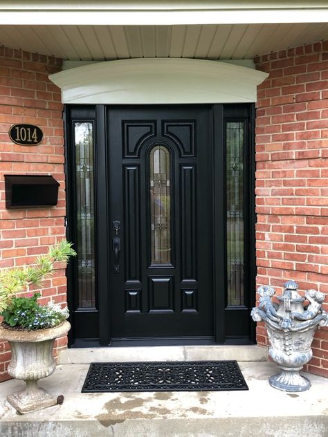 What a gorgeous entry door! Pictured is a ProVia Signet door with sidelights and a decorative fypon headpiece. https://bit.ly/3Qdm7Du Sidelights Front Door, Black Front Door With Sidelights, Front Entrance Doors, Front Door With Sidelights, Door Sidelights, Door With Sidelights, Entry Door With Sidelights, Drafty Windows, Black Front Door