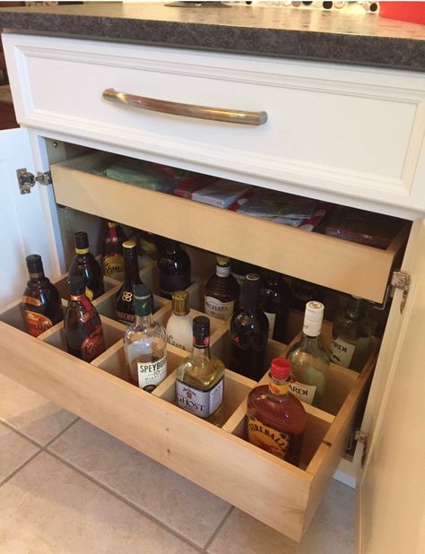 Great way to store your liquor bottles and see them all at once, with out them getting shoved to the back of a shelf or above the cabinet of your refrigerator! Cabinet Above Refrigerator, Above Refrigerator, Liquor Storage, Kitchen Bar Design, Home Wet Bar, Basement Bar Designs, Built In Bar, Bar Storage, Bar Designs