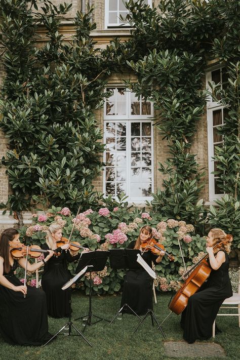 Live wedding music seated outside the wedding venue while guests socialise String Quartet Wedding, Live Band Wedding, Classic Black Tie Wedding, Wedding Music Band, Wedding Planning Boards, Hedsor House, Jazz Sheet Music, Dream Wedding Venues, Multicultural Wedding