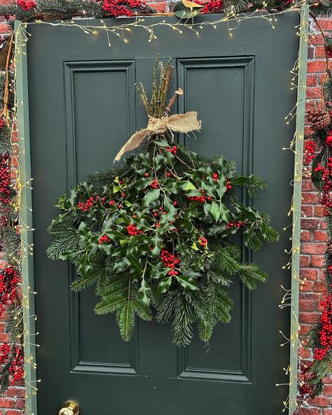 •F E S T I V E I D E A S• Our team has been busy creating more holly and foliage swags all with locally foraged materials. Swags are… | Instagram Christmas Foliage Decorations, December Arrangements, Foraged Christmas Decorations, Holly Arrangement, Xmas Swags, Foraged Christmas, Natural Wreaths, Christmas Door Swag, Christmas Foliage