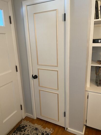 Do you have old, outdated, simply blah doors and would love new ones but just can’t fathom the amount they cost? Don’t worry, I get it. I did too! When I moved in, my house had plain brown doors from the 70's that I absolutely hated. This quick and easy DIY will transform them into what looks like brand new doors! And, the best part is that it only costs $15!When I first moved in my doors looked like this... I immediately painted them all white and updated the hardware. For two years… Door Update, Caulk Paint, Diy Interior Doors, Chair Rail Moulding, Diy Will, Custom Pantry, White Closet, Panel Interior Doors, Brown Doors