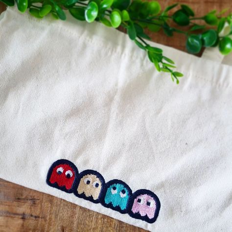 🎮 Level up your style with our custom tote bags! ���🌟 Hand-stitched with iconic designs like this retro Pac-Man theme. Perfect for gamers and vintage lovers alike. Make a statement and carry your own custom icons. 🛍️👾 #customtotebag #pacman #handmade #retrogaming #embroidery #gameover #shoplocal #smallbusiness #peronlisedclothing #customdesign #comingsoon #nostalgia Spy Family Embroidery, Gamer Embroidery, Vintage Lovers, Spy Family, Retro Game, Custom Tote Bags, Embroidery Motifs, Custom Icons, Pac Man