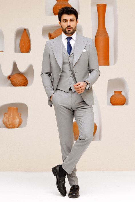 Elevate your style with this grey 3-piece slim-fit suit. The wide lapels on the jacket create a bold statement, while the matching lapels on the vest complete the look. Perfect for any event where you want to make a lasting impression. #mensfashion #mensstyle #menssuits #menswear #suitup #classicstyle #timelessfashion #gentlemanstyle #dapperlook #formalattire Blazer Waistcoat, Grey Slim Fit Suit, Double Breasted Tuxedo, Suit Stores, Suit Styles, Slim Fit Suit Men, Classy Suits, Slim Fit Tuxedo, 2 Piece Suit