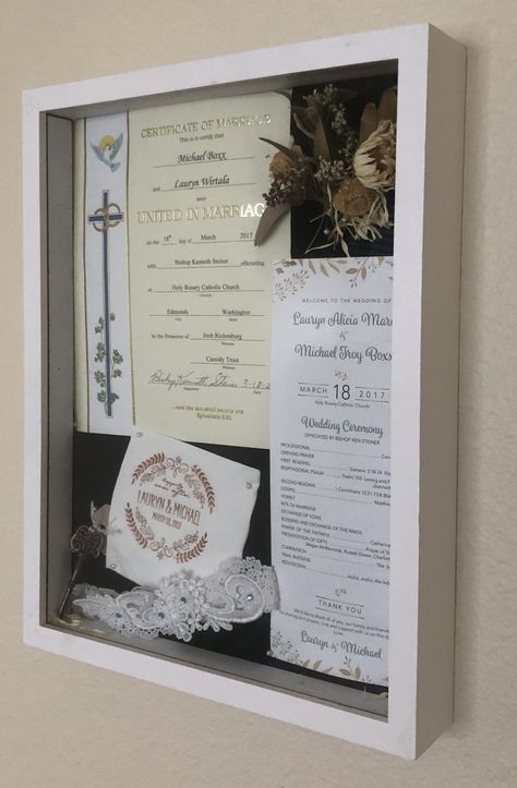 Shadow box with keepsakes from the wedding day. Flowers, garter, napkin, marriage license, program, and favor. Marriage License Display Ideas, Marriage License Display, Marriage Certificate Display, Wedding Shadowbox, Witchy Wedding, Wedding License, Wedding Shadow Box, Holy Rosary, Long Hair Wedding Styles