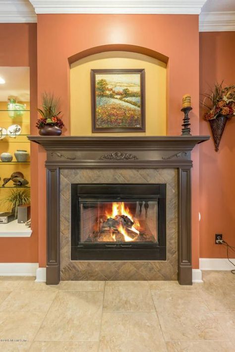 Copper Harbor by Sherwin Williams Sherwin Williams Copper Harbor, Orange Paint Colors, Copper Harbor, Office Paint, Orange Paint, Fireplace Ideas, Room Color, Interior Paint Colors, Painted Paneling