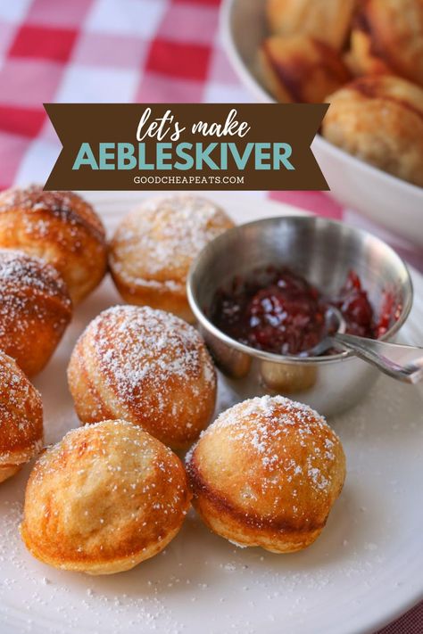 Enjoy a traditional Danish treat when you make Aebleskiver Danish pancakes. Traditionally served at Christmas, Aebleskiver are a special December dessert, often served with powdered sugar and raspberry jam. While typically made in an aebleskiver pan, in this post I'll show you how to make these Danish pancake balls in a cake pop or donut hole maker. Serve them with Raspberry Sauce for a fun homemade dessert this season. Round Pancake Balls, Pancake Balls Cake Pop Maker, Aebleskiver Recipe Easy, Danish Breakfast Traditional, Aebleskiver Pan Recipes, Norwegian Desserts, Danish Dishes, Danish Pancake Balls, Aebleskiver Recipe