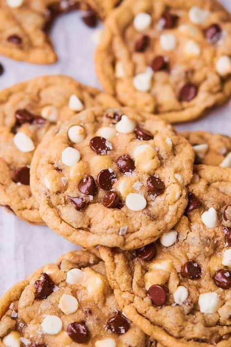 These Chocolate Chip and White Chocolate Chip Cookies are like two cookies in one! These delicious cookies are an elevated version of classic chocolate chip cookies, bursting with both semi-sweet chocolate chips and white chocolate chips. These chewy cookies have nice crispy edges, and they will definitely satisfy your sweet tooth. White Chocolate And Chocolate Cookies, Chocolate Chip Cookies With White Chips, Milk And White Chocolate Chip Cookies, Dark And White Chocolate Chip Cookies, Chocolate And White Chip Cookies, Black And White Chocolate Chip Cookies, Cookie With White Chocolate Chips, White And Chocolate Chip Cookies, White Chocolate Chip Desserts