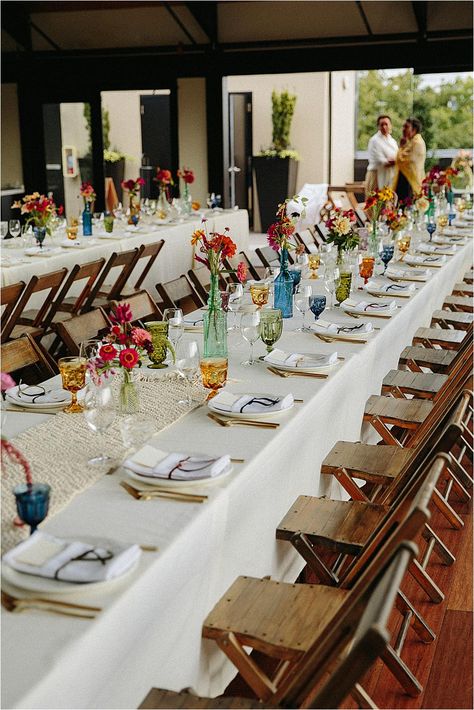 Colourful Table Setting Wedding, Colorful November Wedding, French Farm Wedding, Wedding Table Decorations Colourful, Casual Wedding Table Settings, Colorful Glassware Wedding, Wedding Farm Table Decor, Backyard Wedding Table Set Up, Farm Tablescape