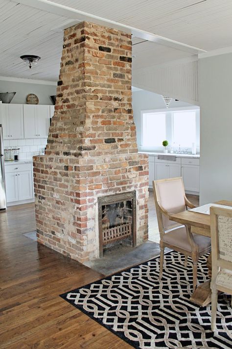 Elizabeth Burns Design | Farmhouse Fixer Upper - exposed brick chimney with antique brick during budget renovation house flip Antique Brick Fireplace, Exposed Brick Fireplaces, Farmhouse Fixer Upper, House Before And After, Antique Brick, Brick Chimney, Double Sided Fireplace, Farmhouse Fireplace, Farmhouse Remodel