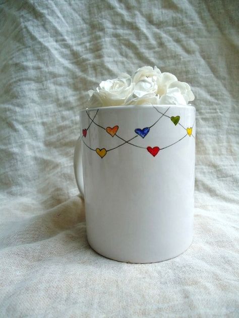 Heartstrings hand-painted mug Simple Mug Designs Painted, Painting Mugs Ideas Easy, Simple Mug Designs, Diy Mug Painting, Drawing On Mugs, Ceramic Painting Ideas Easy, Mug Art Paint, Hand Painted Mugs Ideas, Painting Mugs Ideas