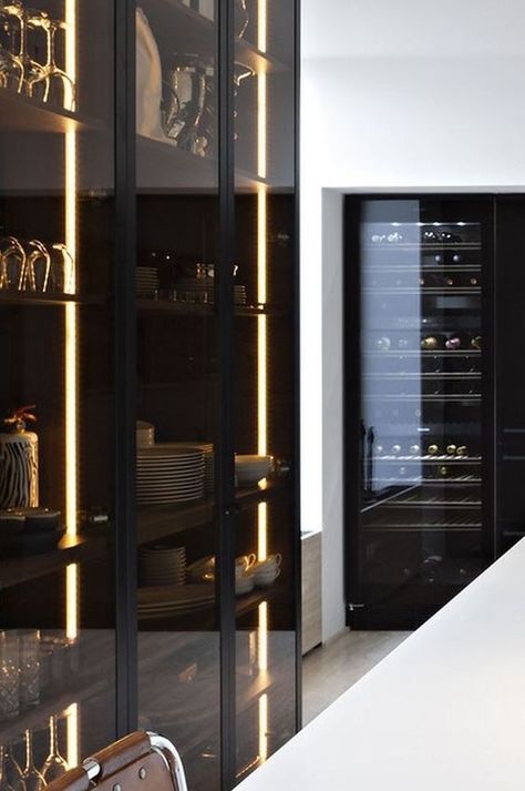 lit up smoke glass kitchen cabinets are ideal for masculine or minimalist spaces and look edgy Kitchen Appliances Black, Black Cupboards, In Home Theater, Black Kitchen Cabinet, Black Appliances Kitchen, Glass Kitchen Cabinets, Glass Cupboard, Kitchen Concepts, Kitchen Cabinet Doors