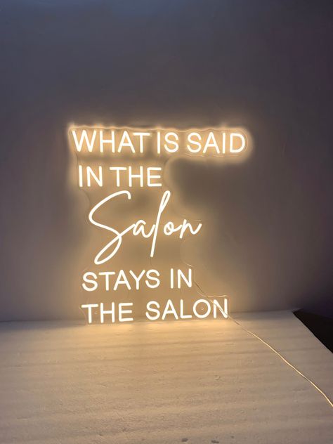 What is Said in the Salon Stays in the Salon neon sign is LED neon sign, It's made of acrylic and led stripe, safe and durable to use in bar bedroom, living room and any room, A great addition for pizza lovers 【Express Shipping】Ship out in 3-7 days. ✈️ Shipped by DHL/Fedex/UPS takes 3-7 days. WHAT'S INCLUDED? ● Finished Neon Sign ● 2meter Clear Cable ● A Black Adapter ● Plug, plug into the socket ● Advertising SCrew ● Dimmer & Remote, adjust the brightness Features for LED Neon Sign * Durable: i Salon Signage Ideas, Salon Soft Opening Ideas, Salon Art Work, Boho Style Nail Salon, Salon Room Ideas Home, Home Beauty Salon Ideas Small Modern, Beauty Suite Decor Ideas, Salon Entry Way Ideas, Hair Salon Suites Decor