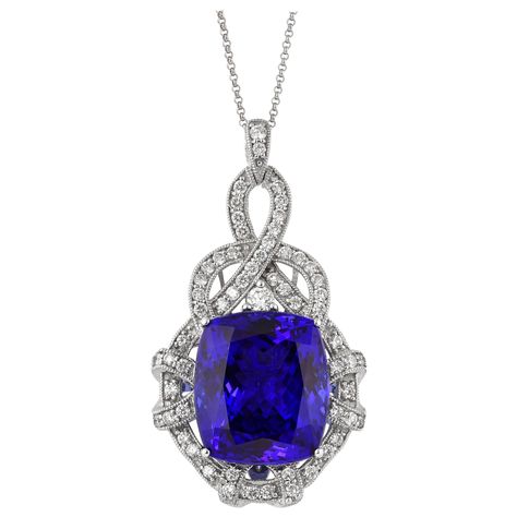 This collection features a selection of the most tantalizing Tanzanites. This enchanting East African gemstone can only be procured from one mine in the foothills of Mount Kilimanjaro, Tanzania. We have accented the rich purple-blue hues of this gemstone with diamonds set in white gold to present a rich and regal look. Classic tanzanite pendant in 18K white gold with diamonds. Tanzanite: 21.96 carat cushion shape, 17x14.81mm size. Diamonds: 1.000 carat, G colour, VS clarity. Gold: 9.41g, 18K white gold. Ring Size: US 6.75 - Size can be adjusted for free upon request - please reconfirm with your order. TZ4 Kilimanjaro Tanzania, Tanzanite Pendant, Mount Kilimanjaro, Rich Purple, Royal Jewelry, Adriana Lima, Jewellery Design, Blue Hues, Birthstone Jewelry