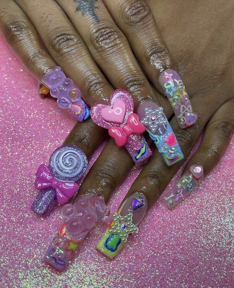 Nail Length Chart, Junky Charm Nails, Acrylic Nails With Gummy Bear Charms, Pink Nails With Gummy Bear Charms, Big Hello Kitty Charm Nails, Chrome Y2k Nails + Charms, Nail Designs Bling, Sunflower Nails, Purple Acrylic Nails